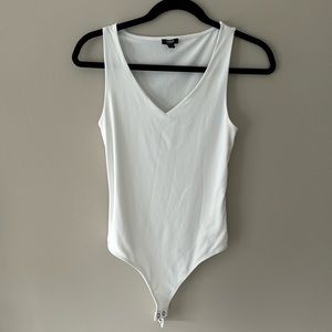 NWOT Express body contour body suit in white color
